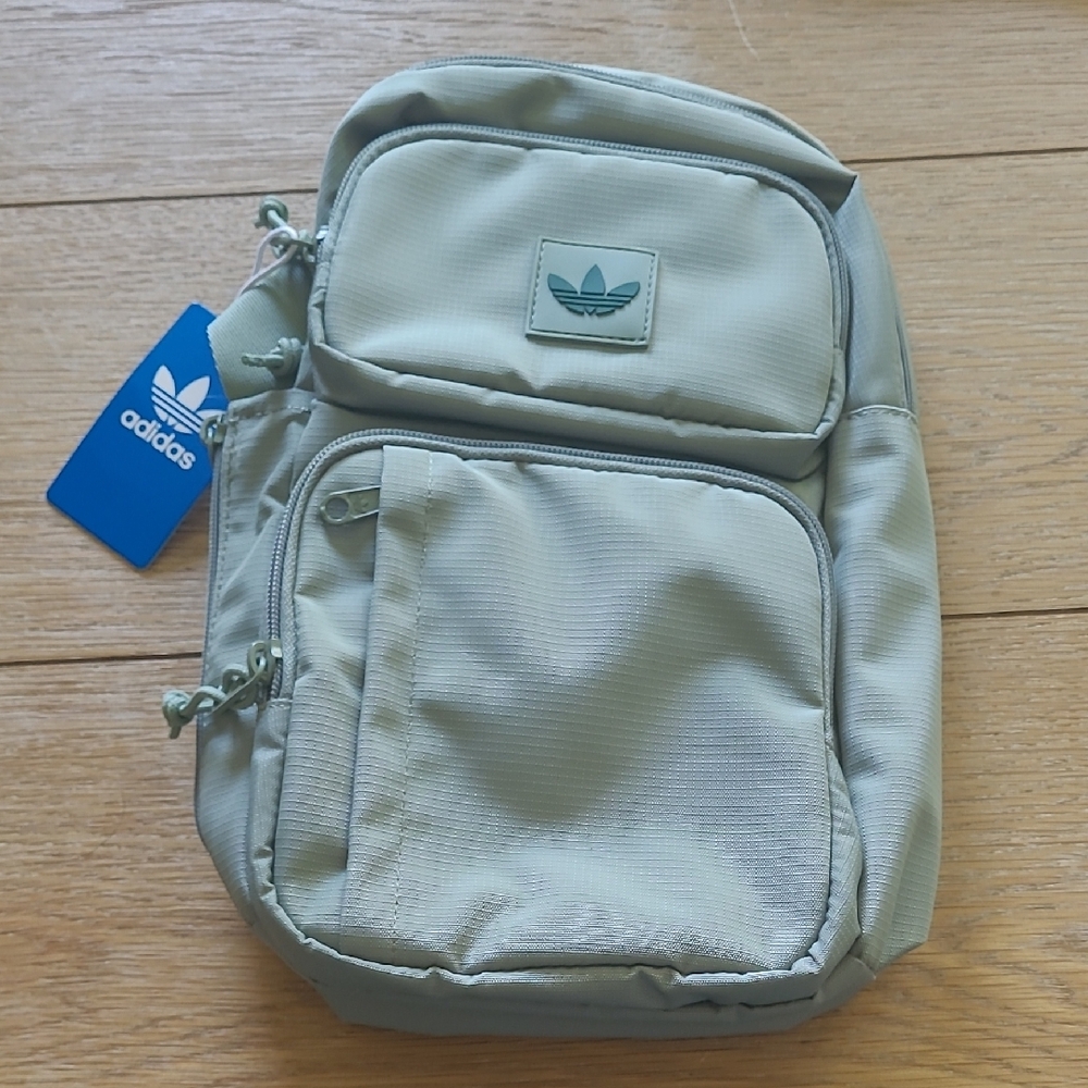 Adidas Green Backpack with Trefoil Logo and Clean Design